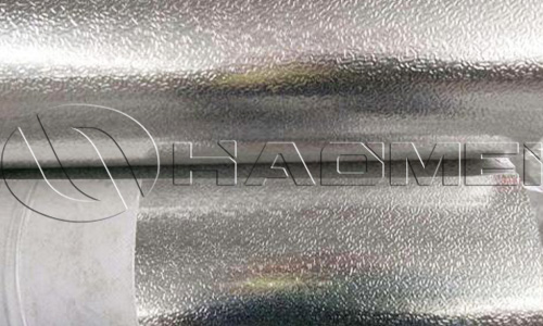 Stucco embossed aluminum cladding sheet
